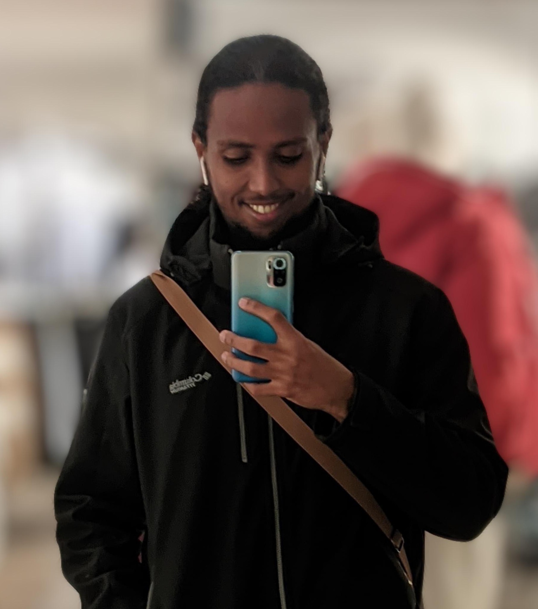 Ahmed Osman Mahamoud, Captain (no official role, hangs with everyone and makes jokes). from Djibouti